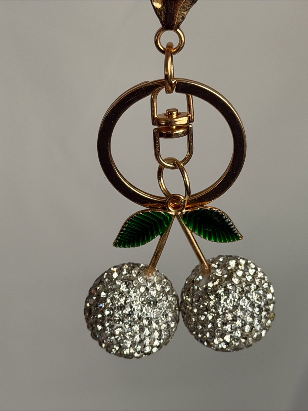 Gold Cherry Crystal Pendant with Green Enamel Leaves